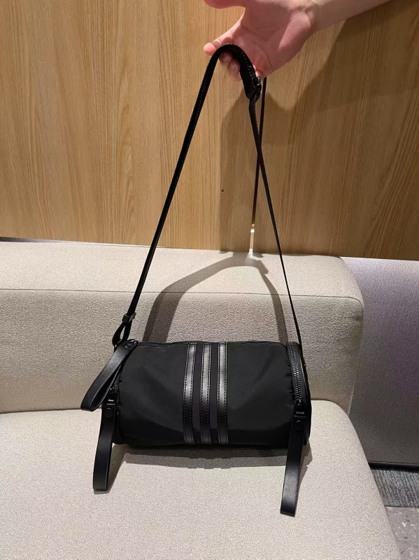 Nova casual crossbody torba s velikim kapacitetom, cilindričnog oblika, od Oxford platna