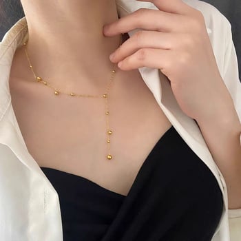 Ženski ogrlicu od titan čelika s resicama i zlatnom kuglicom — pristupačan luksuz, nišni dizajn, ogrlica za ključnu kost, 18K zlatna nijansa