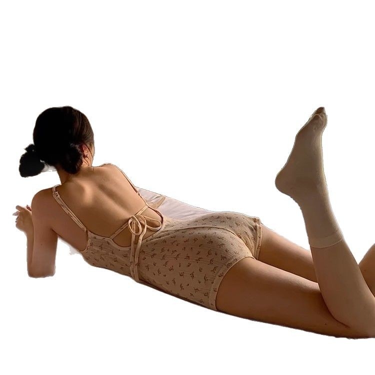 Ženski seksi floralni romper s trakama i otvorenim leđima