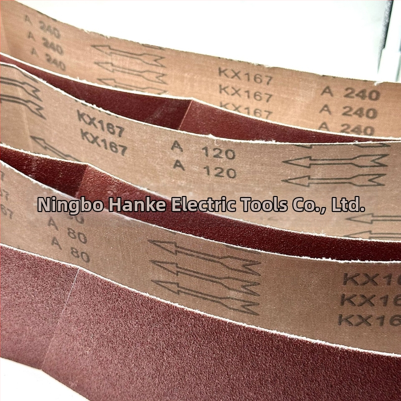 Brúsny pás 915×100 mm, hnedý korund pre drevo, kov a kameň – textilná podložka, červené brúsne zrno