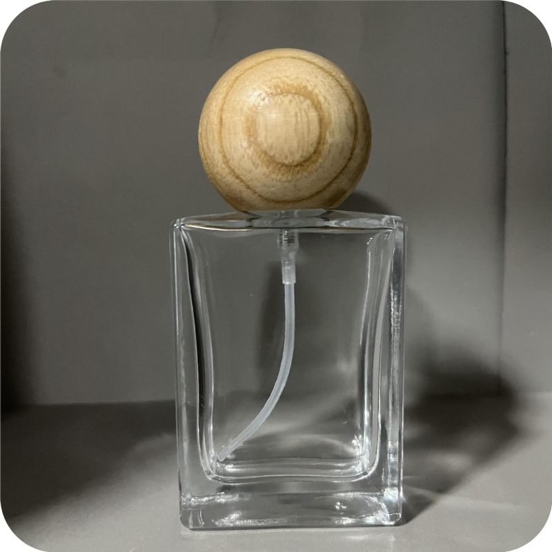 Kiváló minőségű négyszögletes üveges parfümösüveg fa kupakkal, csavaros kupakkal, 30 ml, 50 ml, 100 ml
