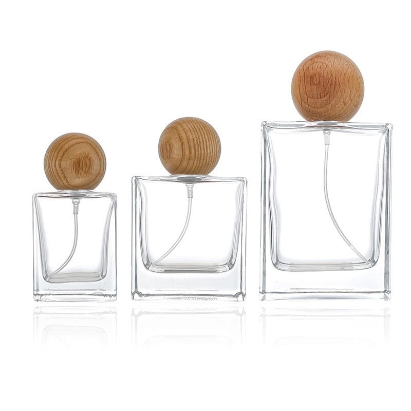 Kiváló minőségű négyszögletes üveges parfümösüveg fa kupakkal, csavaros kupakkal, 30 ml, 50 ml, 100 ml