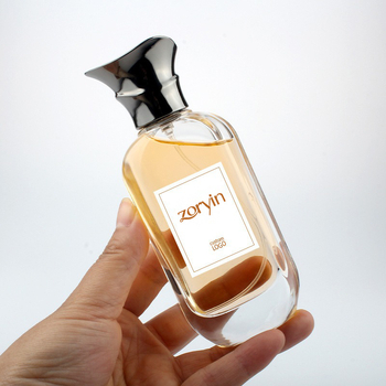 Prozirna staklena bočica za parfem s okruglim ramenima i debelim dnom, 50 ml ili 100 ml, raspršivač s poklopom od cinkovog legura, bočica za dopunu
