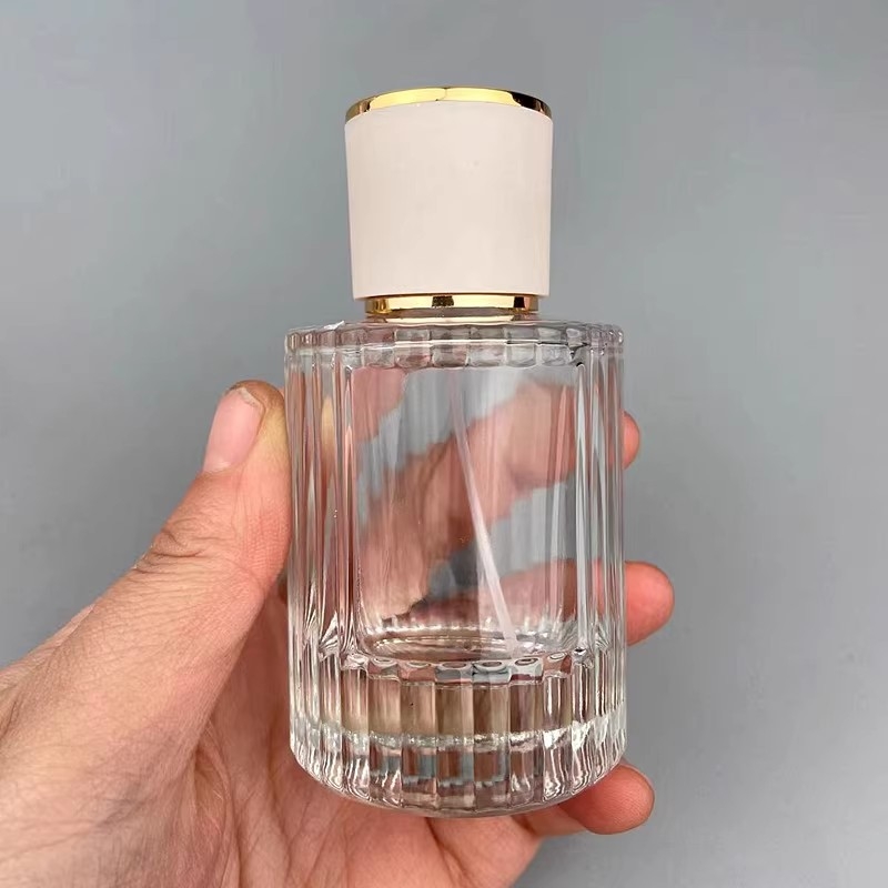 Függőleges csíkos, hengeres parfümös üveg, átlátszó üveg, kapacitás 30/50/100 ml, 15 menetű permetezőfej