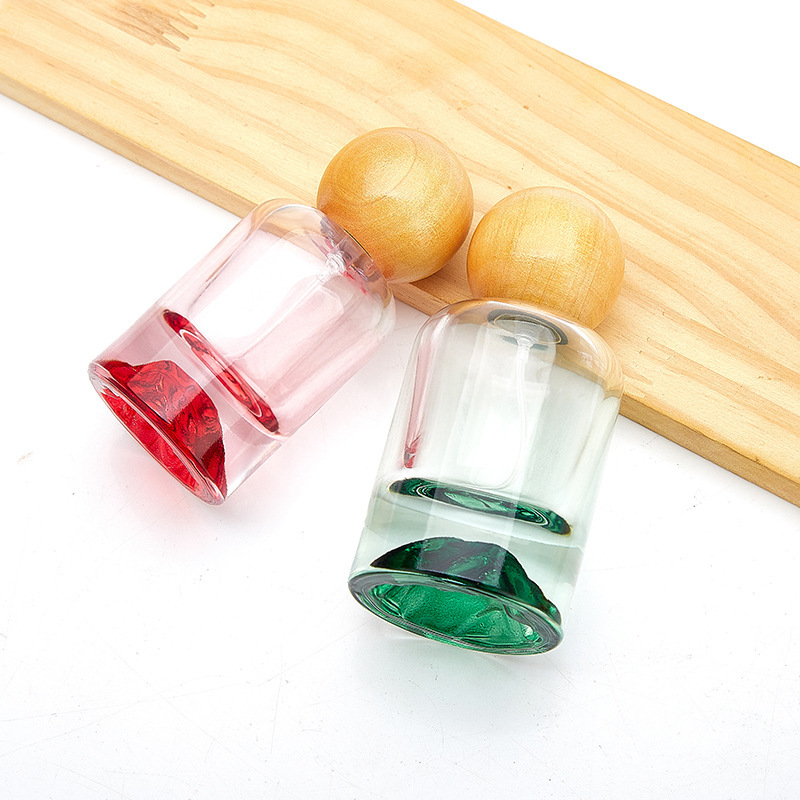 Vulkán-alapú hengeres parfümös üveg, 30 ml, átlátszó, színes díszítéssel, permetező fej
