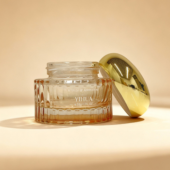 Luxus kozmetikai csomagolóüveg készlet: 100 ml-es pumpás lotion üveg és 50 g-os arckrém üveg.