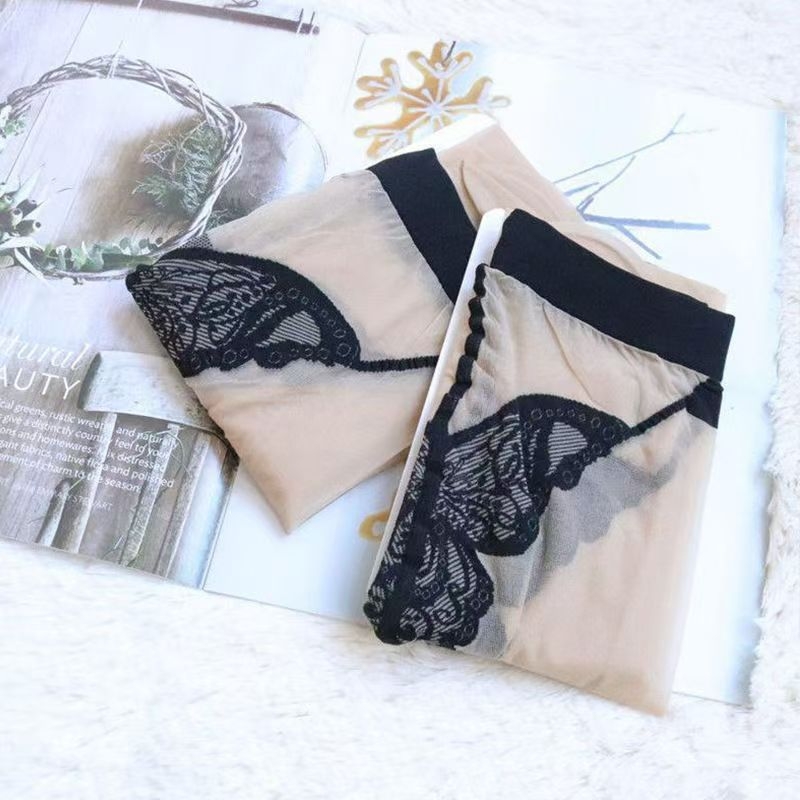 Crne ženske pantyhose od core-spun vlakana, ultra tanke, s izvezena leptira u preponama