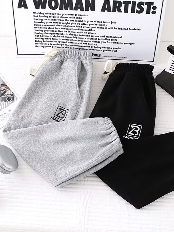 Gyerekeknek készült koreai stílusú sportos jogger nadrág rugalmas mandzsettával, laza szabású, széles szárú, egyszínű, nyári modell 2025