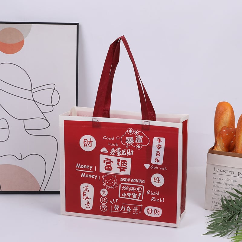 Torba od netkanog materijala, crveno laminirano završna obrada, vodootporna torba za kupovinu odjeće, ekološki prihvatljivo, mogućnost tiska logotipa, velika kapaciteta
