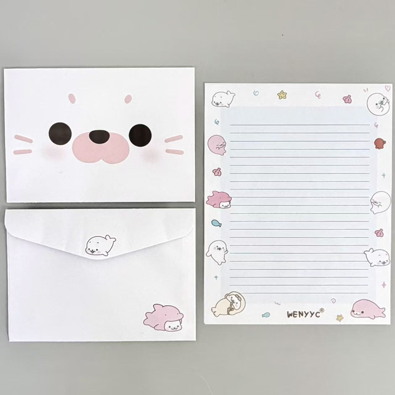 Minimalistički set kuverti i papira za pisanje sa slatkim malim fokom i karikaturnim likovima
