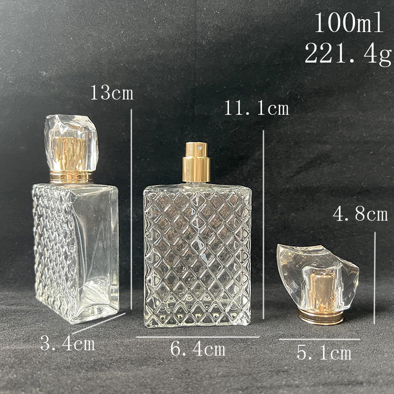 B124 négyszögletes üvegből készült parfümös üveg arany kupakkal, csavaros nyakkal, 100 ml és 50 ml, üres kozmetikai spray palack