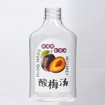 350 ml PET gyümölcslé üveg fehér műanyag kupakkal