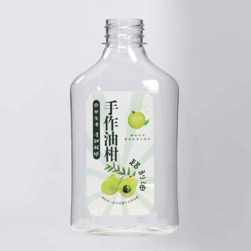 350 ml PET gyümölcslé üveg fehér műanyag kupakkal