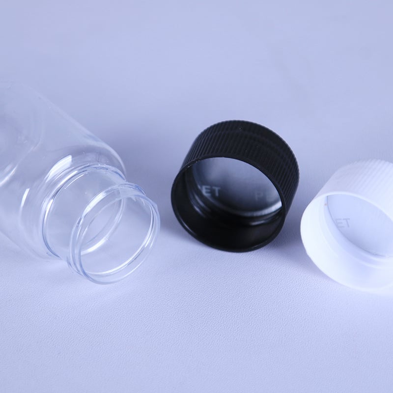 PET nagy szájú, átlátszó, kerek üveg, 30 ml, kupakkal
