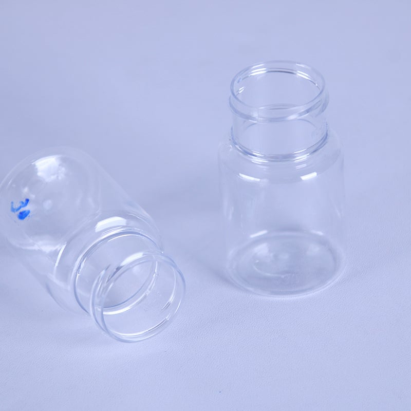 PET nagy szájú, átlátszó, kerek üveg, 30 ml, kupakkal