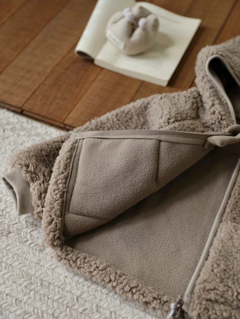 Dječja jakna od teddy fleece s kapuljom i zatvaračem na zip, unisex, zima 2025