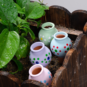 Dispozitiv ceramic pentru irigare prin picurare, roșu, cu model cu buline, dispozitiv compact de udare a plantelor