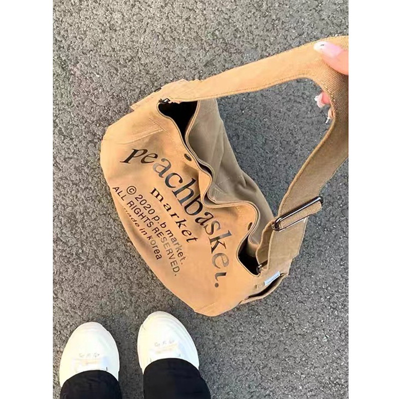Ženska platnena torba s printom slova, velikog kapaciteta, crossbody stil, proljeće 2026 moda