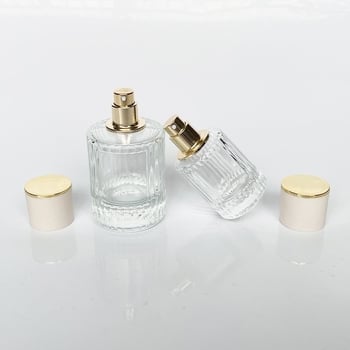 Átlátszó henger alakú parfümös üveg, üres, 30ml/50ml permetezővel