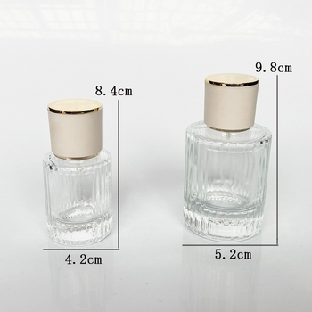 Átlátszó henger alakú parfümös üveg, üres, 30ml/50ml permetezővel