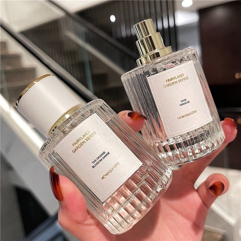 Átlátszó henger alakú parfümös üveg, üres, 30ml/50ml permetezővel