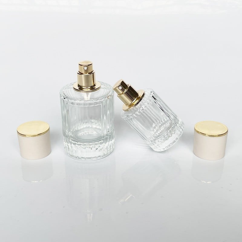 Átlátszó henger alakú parfümös üveg, üres, 30ml/50ml permetezővel