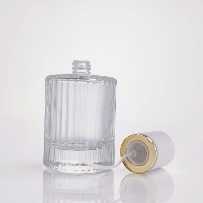 Átlátszó henger alakú parfümös üveg, üres, 30ml/50ml permetezővel