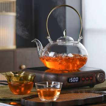 Ceainic din sticlă borosilicată, mâner din cupru, filtru încorporat