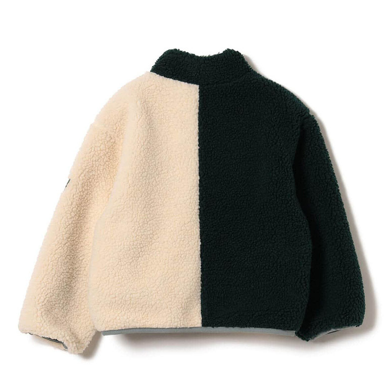 Gyerekeknek készült téli kabát fleece bélésével, kétoldalas cipzárral és álló gallérral, patchwork mintázattal