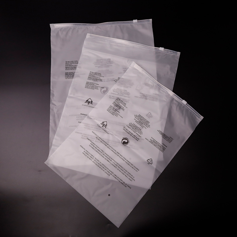 Pungă transparentă din plastic cu fermoar și etichetă de avertizare, finisaj mat, ambalaj pentru haine, personalizabilă