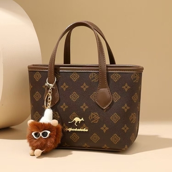 Ženska kožna mala kvadratna torbica s retro otiskom, crossbody, preko ramena i u ruci, svestrana i stilska dnevna torba.