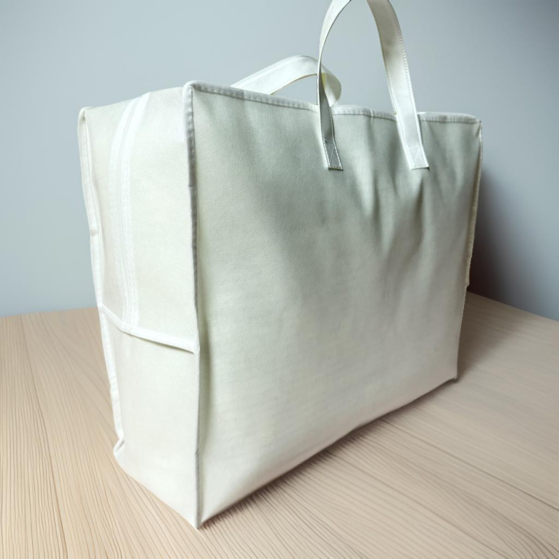 Geantă albă din material nețesut, cu fermoar, pentru ambalarea textilelor de casă și a îmbrăcăminii – imprimare logo disponibil