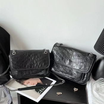 Ženska mala crossbody torbica s lancem od prave kože, messenger stil, proljeće 2025
