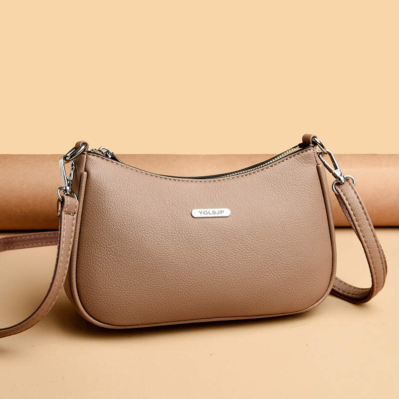 Ženska torba u francuskom stilu, trend sedla, proljeće 2025, mala crossbody torba