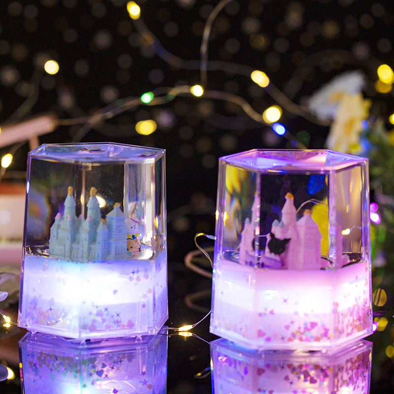 Clepsidră lichidă în formă de castel creativ, cu iluminare, design hexagonal în formă de picătură de ulei, jucărie muzicală pentru copii, decor de birou