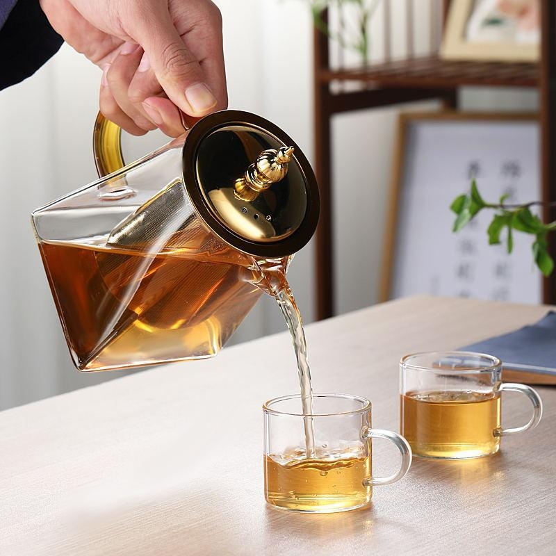 Ceainic din sticlă rezistentă la temperaturi, cu infuzor din oțel inoxidabil, finisaj auriu, pentru uz casnic și de birou, include căniță pentru distribuirea ceaiului