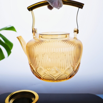 Ceainic cu mâner din cupru și sticlă borosilicat, culoare ambra, poate fi încălzit pe aragaz ceramic electric, cu strecurător din oțel inoxidabil, pentru uz casnic