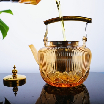 Ceainic cu mâner din cupru și sticlă borosilicat, culoare ambra, poate fi încălzit pe aragaz ceramic electric, cu strecurător din oțel inoxidabil, pentru uz casnic