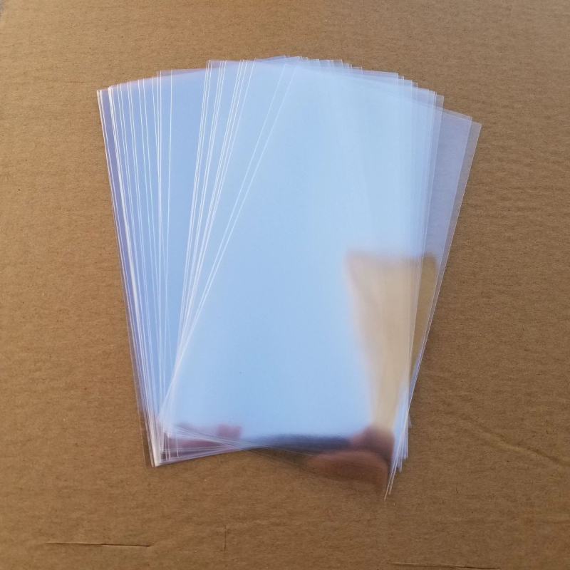 Pungi transparente pentru ambalarea de acadele, gustări cu căpșune, biscuiți copți și bomboane de casă; pungă de bomboane cu temă Om de zăpadă