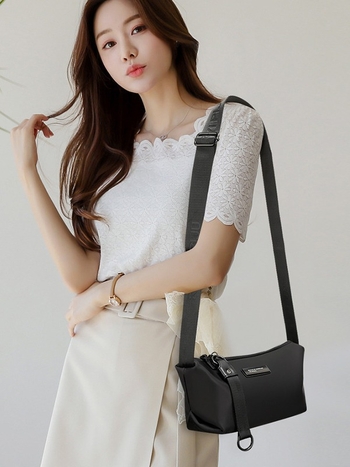 Crna vodootporna crossbody torba od Oxford platna za mlade žene – svakodnevna praktičnost, ulični stil, dumpling oblik