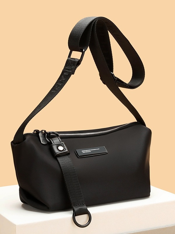 Crna vodootporna crossbody torba od Oxford platna za mlade žene – svakodnevna praktičnost, ulični stil, dumpling oblik