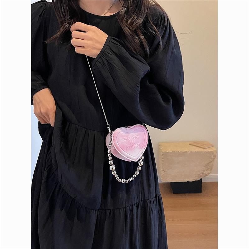 Srebrna mini ženska torbica, novi model 2025, s lancem u obliku srca i crossbody remenom
