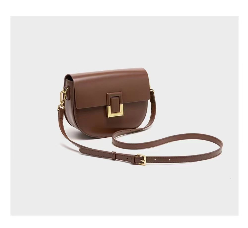 Torba tipa sedla s premium teksturom, kompaktna kvadratna crossbody torba za žene