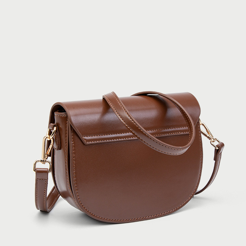Torba tipa sedla s premium teksturom, kompaktna kvadratna crossbody torba za žene