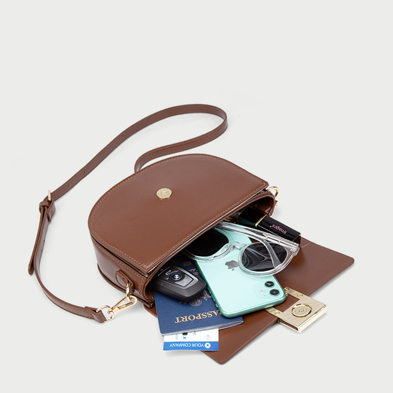 Torba tipa sedla s premium teksturom, kompaktna kvadratna crossbody torba za žene