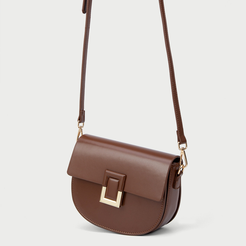 Torba tipa sedla s premium teksturom, kompaktna kvadratna crossbody torba za žene