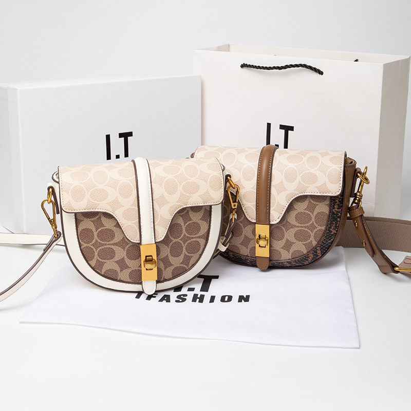 Ženska torbica od prave kože s polukružnim oblikom, 2025 nova moda, svestrana i visoke kvalitete crossbody torba, retro torba u stilu sedla, mala veličina.