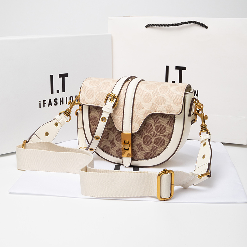 Ženska torbica od prave kože s polukružnim oblikom, 2025 nova moda, svestrana i visoke kvalitete crossbody torba, retro torba u stilu sedla, mala veličina.
