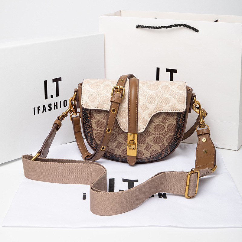 Ženska torbica od prave kože s polukružnim oblikom, 2025 nova moda, svestrana i visoke kvalitete crossbody torba, retro torba u stilu sedla, mala veličina.