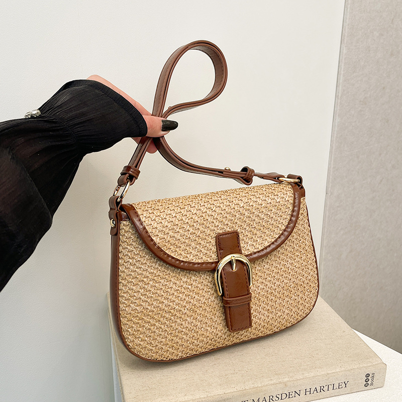 Korejska tkanina torbica tipa sedlo za žene, 2025 modna crossbody torbica s pletenim dizajnom od slame